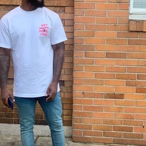 I am selling a Anti Social Social Club Shirt with dark pink letters .